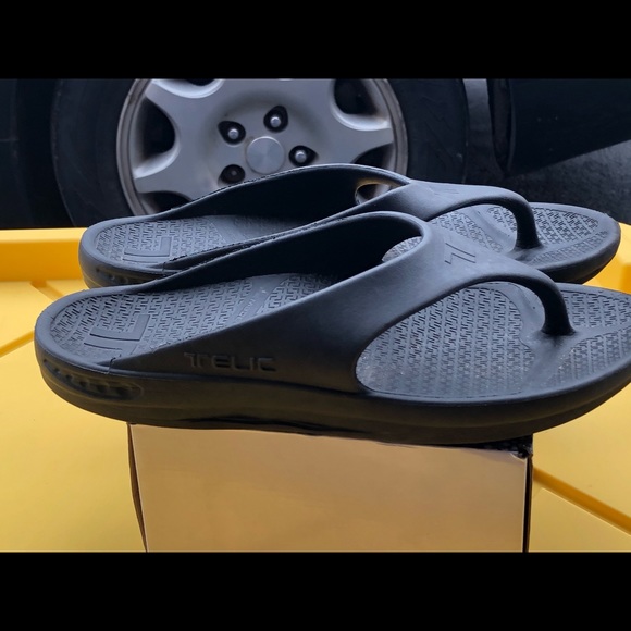 black dress and red shoes outfit